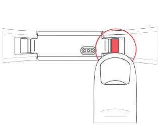 Tracker ondersteboven waarbij de knop is gemarkeerd waarmee het bandje kan worden losgemaakt, aan het uiteinde van het bandje bij de behuizing